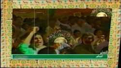 The masses rally around Brother Leader of the Revolution Muammar Gaddafi in the city of Khoms