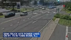 Video captures semi-truck bringing down power lines in NJ
