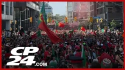 Drone footage shows sea of red and green Portugal supporters marching to Toronto Stadium