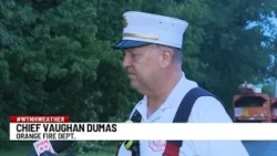 Man rescued from vehicle stuck between fallen tree and utility pole in Orange