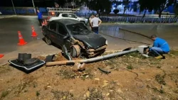 Car with no brakes: unlicensed driver hits utility pole, falling onto another vehicle