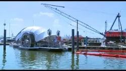 Professor Trash Wheel returns to Baltimore Harbor with a brand new barge