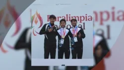 5582 FT Athletes Jimena Perez and Fernando Irineo reach the podium at the Paralimpiada
