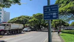 Pedestrian crossing signage posted at high-traffic Oahu locations