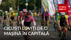 Two cyclists participating in the Tour de France hit by a car