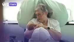 Volunteer Thérèse cuddles babies in hospital