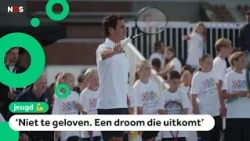 Children get a tennis lesson from tennis hero Roger Federer