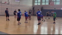 Hancock County Special Olympians dominate first responders during flag football