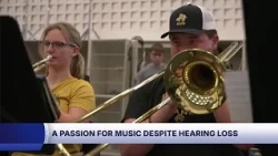 Ashwaubenon drum major finds joy in music despite hearing loss