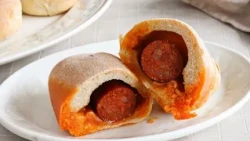 Pan preñao, a homemade bread filled with chorizo, perfect for snacks and informal meals