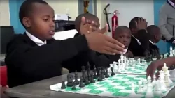 Kenyan children learn to play chess on sets made using plastic waste