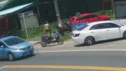 Caught on Cam: Car Reverses into Parked Motorbike