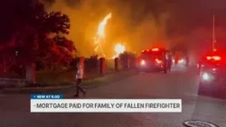 Fallen firefighter's family gets mortgage paid off