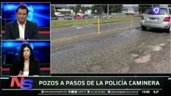 Potholes steps away from the highway patrol