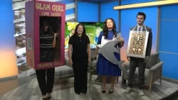Sales manager for Two Men and a Truck shows off Halloween costumes made from moving boxes