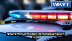 Crews respond to car flipped in Lexington bank’s drive-thru