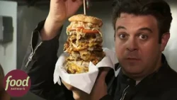 Adam Richman Battles A Massive Twelve Patty Mountain Of Beef And Cheese | Man V Food
