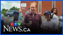 Girls serve up $1K for charities with cool refreshments