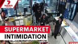 Woolworths workers swarm independent IGA store | 7NEWS