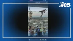 Witnesses capture the moment two men jump off the Space Needle