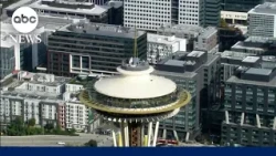 Daredevils scale and jump from Space Needle in Seattle
