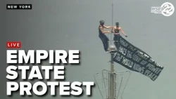 Protesters scale Empire State Building