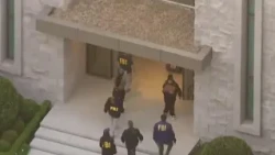 FBI searches home tied to former California Rep. Eric Swalwell