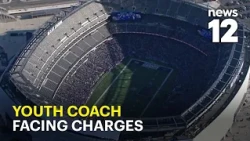 What led to charges against a youth football coach At MetLife?